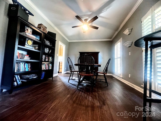 dining area with dark hardwood / wood-style flooring, a wealth of natural light, ceiling fan, and crown molding