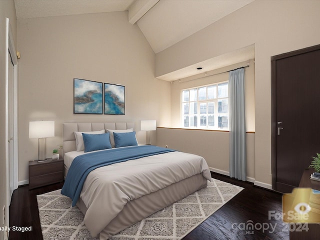 bedroom featuring dark wood-type flooring and vaulted ceiling with beams