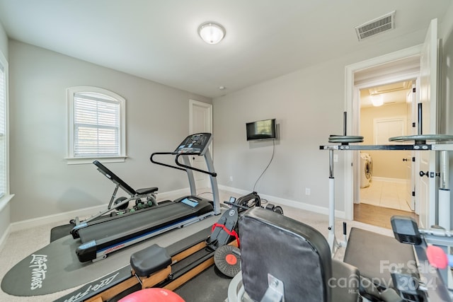 workout area featuring carpet