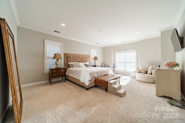 carpeted bedroom featuring crown molding