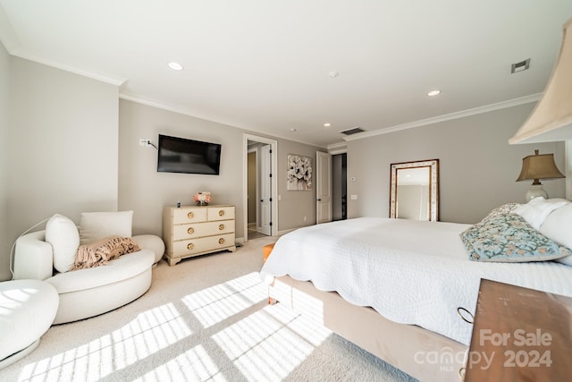 carpeted bedroom featuring ornamental molding