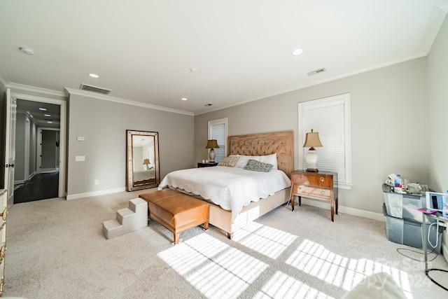 bedroom featuring light colored carpet and crown molding