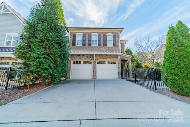 view of front property with a garage