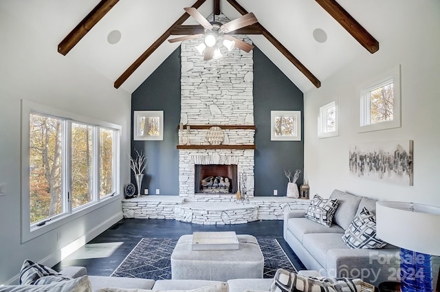 living room featuring high vaulted ceiling, beam ceiling, and a wealth of natural light