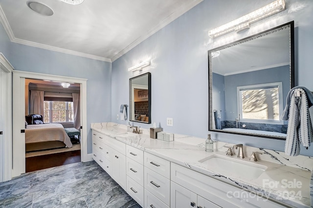 bathroom with crown molding, vanity, and hardwood / wood-style flooring