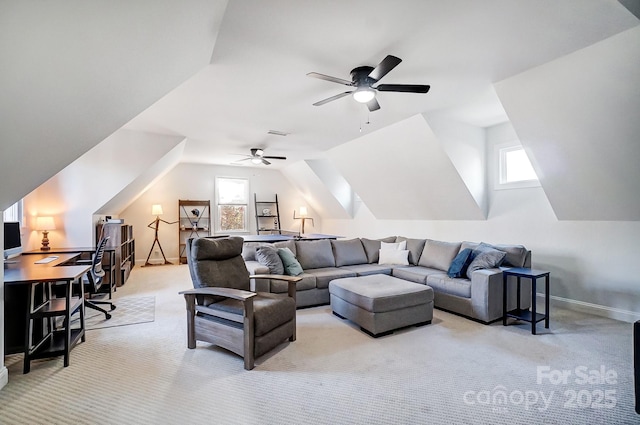 living room with light colored carpet, ceiling fan, lofted ceiling, and baseboards
