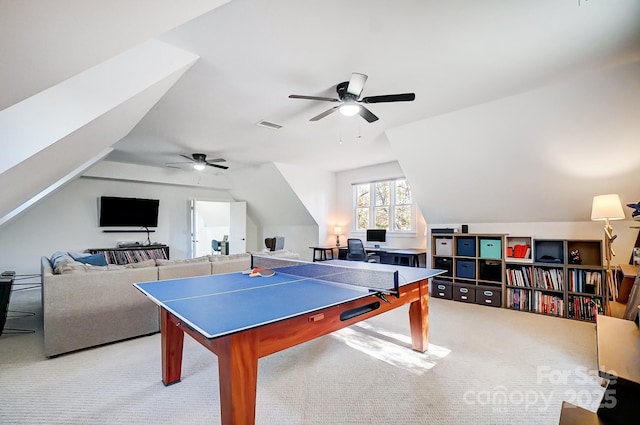 game room featuring vaulted ceiling, visible vents, carpet flooring, and ceiling fan