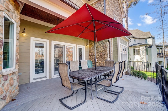 deck featuring outdoor dining space