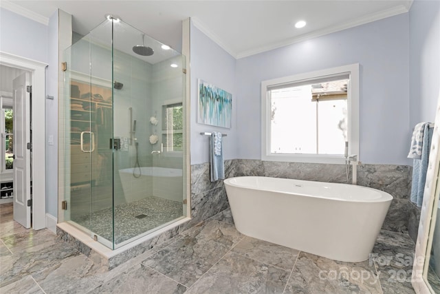 20361 Enclave Oaks Ct, Cornelius, NC 28031 - bathroom featuring a stall shower, healthy amount of natural light, ornamental molding, a soaking tub, and tile walls