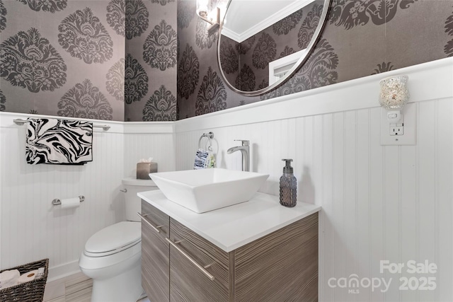 20361 Enclave Oaks Ct, Cornelius, NC 28031 - half bath with a wainscoted wall, vanity, and wallpapered walls