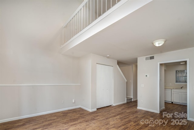 interior space featuring hardwood / wood-style flooring and sink