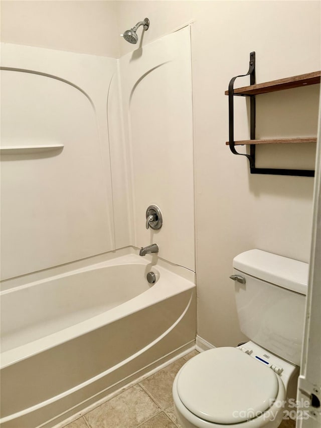 bathroom with toilet, tile patterned floors, and shower / tub combination