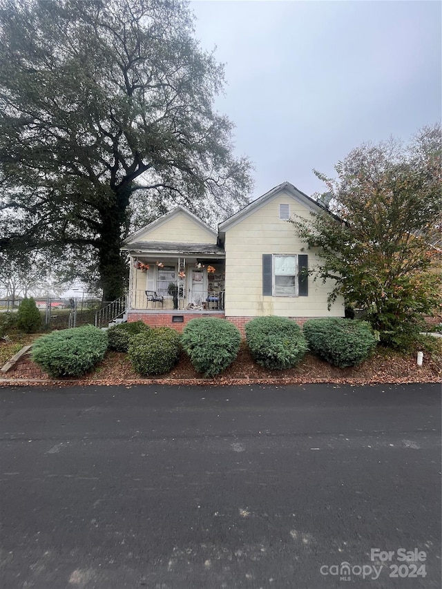 view of front of home featuring covered porch