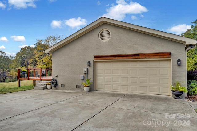 view of side of property with a deck