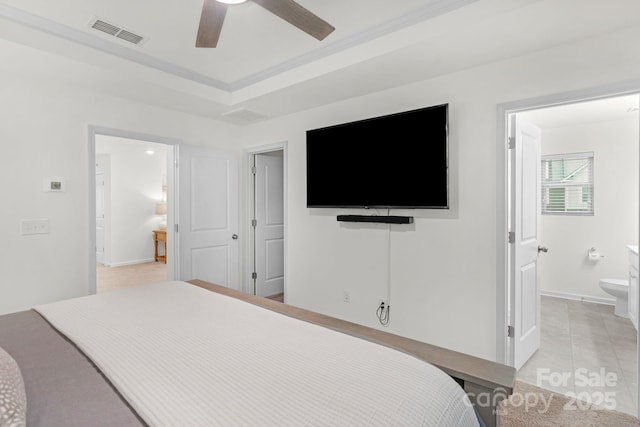 tiled bedroom with connected bathroom, ceiling fan, and ornamental molding