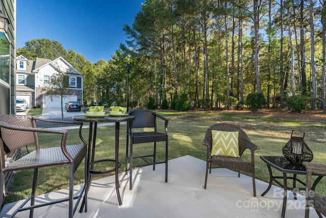 view of patio / terrace with a garage