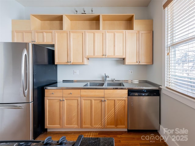 32 Broadway St Unit 230, Asheville, NC 28801 - kitchen featuring light brown cabinets, stainless steel appliances, stainless steel counters, and a sink