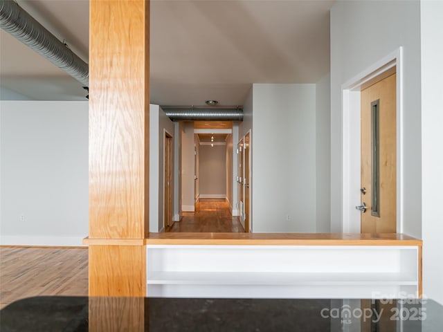 32 Broadway St Unit 230, Asheville, NC 28801 - hallway featuring wood finished floors