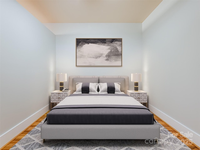 32 Broadway St Unit 230, Asheville, NC 28801 - bedroom with light wood finished floors and baseboards