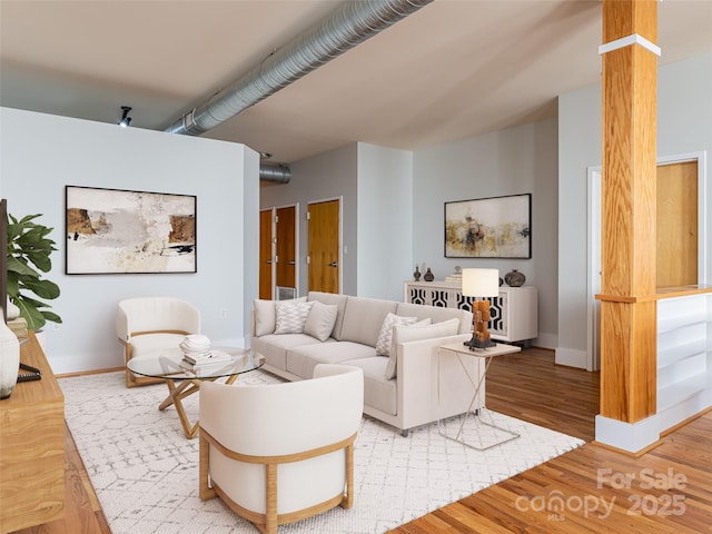32 Broadway St Unit 230, Asheville, NC 28801 - living area with baseboards and light wood-style floors