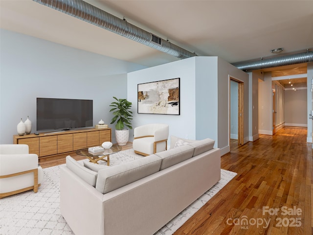 32 Broadway St Unit 230, Asheville, NC 28801 - living area with baseboards and light wood finished floors