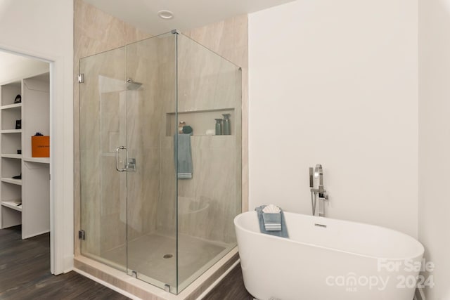 9000 Boyd Dr, Matthews, NC 28105 - full bath with a freestanding tub, a stall shower, and wood finished floors