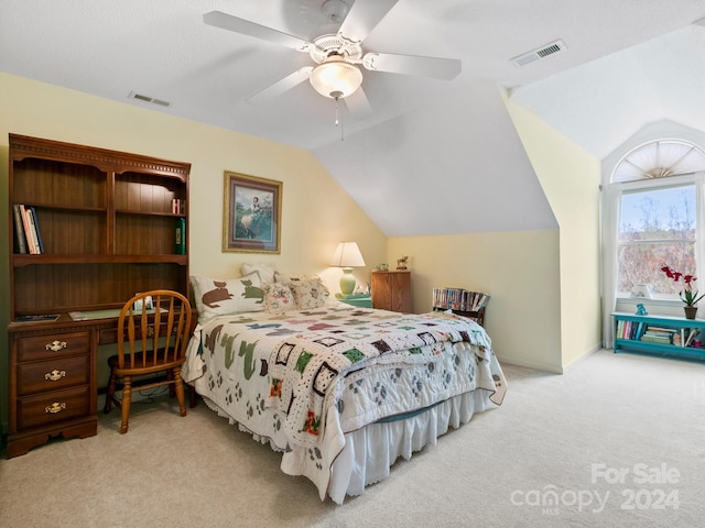 bedroom with light carpet, ceiling fan, and lofted ceiling