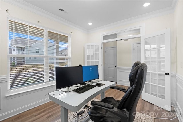 office featuring hardwood / wood-style floors and ornamental molding