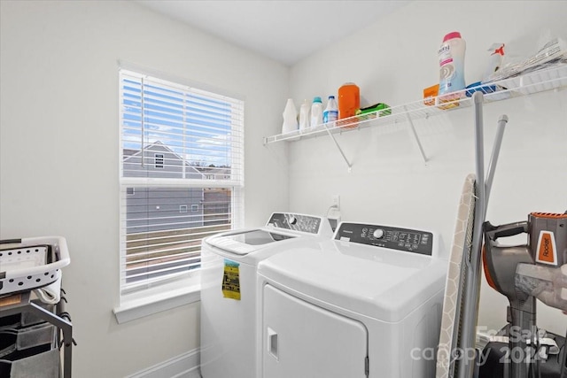 laundry room with washer and clothes dryer