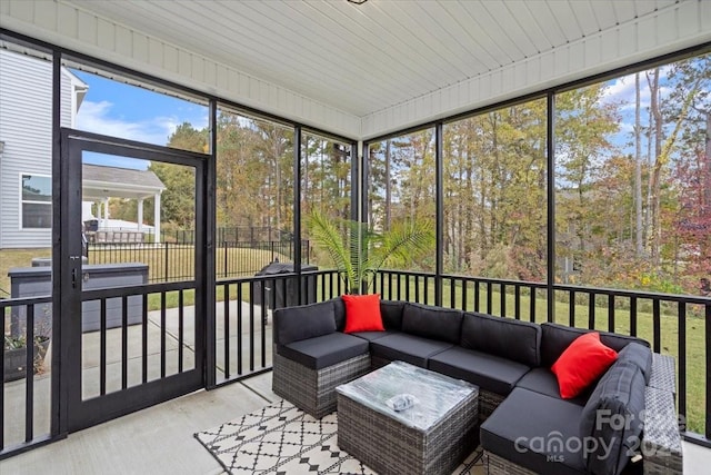 sunroom with wood ceiling