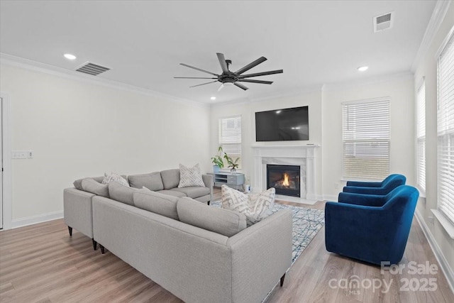 122 W Heart Pine Ln, Statesville, NC 28677 - living room featuring ceiling fan, plenty of natural light, wood finished floors, a high end fireplace, and recessed lighting
