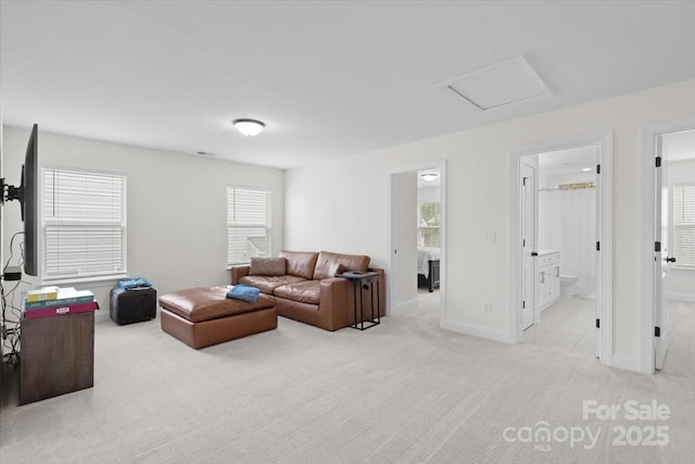 122 W Heart Pine Ln, Statesville, NC 28677 - living room featuring light colored carpet, baseboards, and attic access