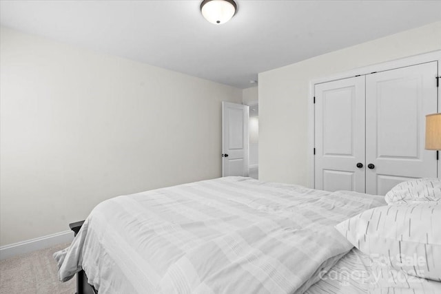 122 W Heart Pine Ln, Statesville, NC 28677 - carpeted bedroom with baseboards and a closet