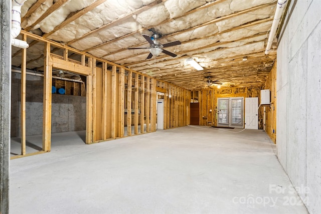 misc room with concrete floors and ceiling fan