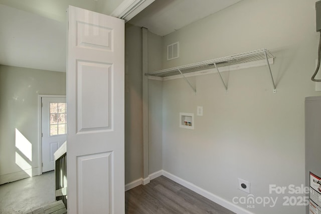 clothes washing area with visible vents, baseboards, hookup for an electric dryer, hookup for a washing machine, and laundry area