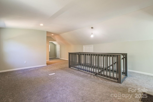 bonus room with visible vents, baseboards, lofted ceiling, carpet flooring, and recessed lighting