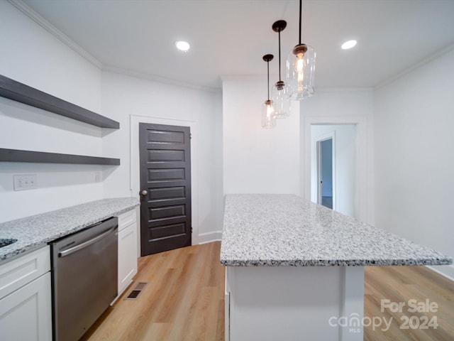 kitchen featuring crown molding, a kitchen island, light hardwood / wood-style floors, white cabinets, and stainless steel dishwasher