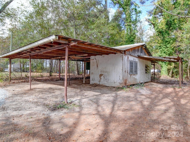 view of patio featuring a carport