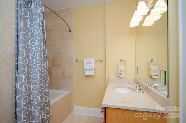 bathroom with vanity, tile patterned floors, and shower / tub combo