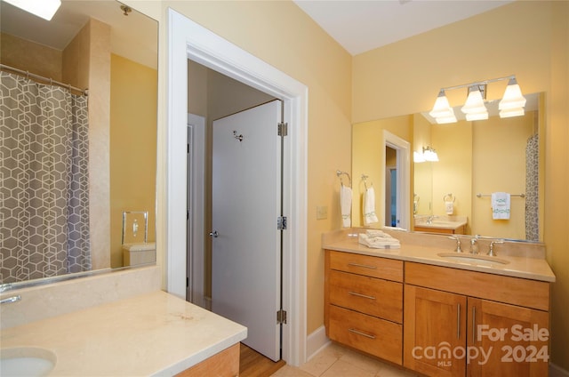 bathroom featuring vanity and wood-type flooring