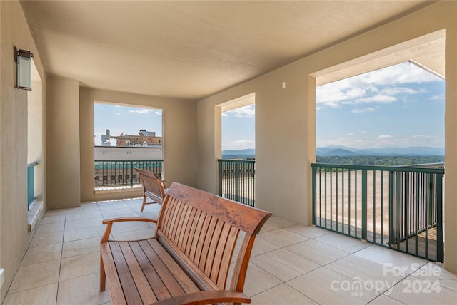 balcony featuring a mountain view