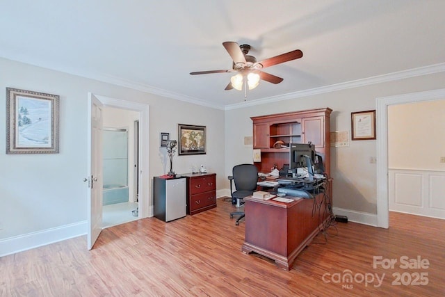 office area featuring ceiling fan, ornamental molding, and light hardwood / wood-style flooring