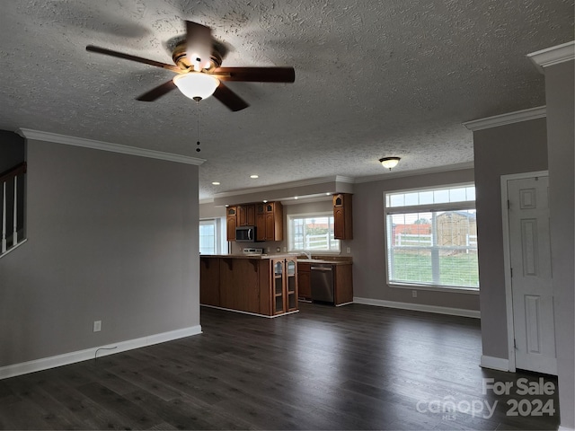 unfurnished living room featuring dark wood-type flooring, a textured ceiling, sink, ornamental molding, and ceiling fan