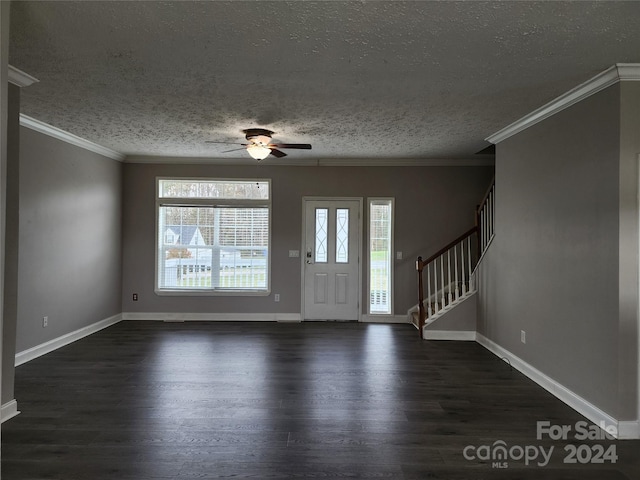 129 Burning Ln, Stony Point, NC 28678 - entrance foyer featuring dark wood-type flooring, stairway, a ceiling fan, baseboards, and crown molding
