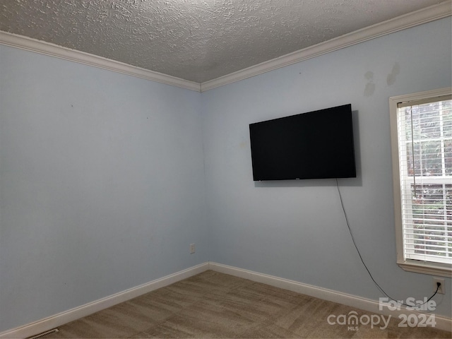 129 Burning Ln, Stony Point, NC 28678 - empty room featuring ornamental molding, a textured ceiling, baseboards, and carpet