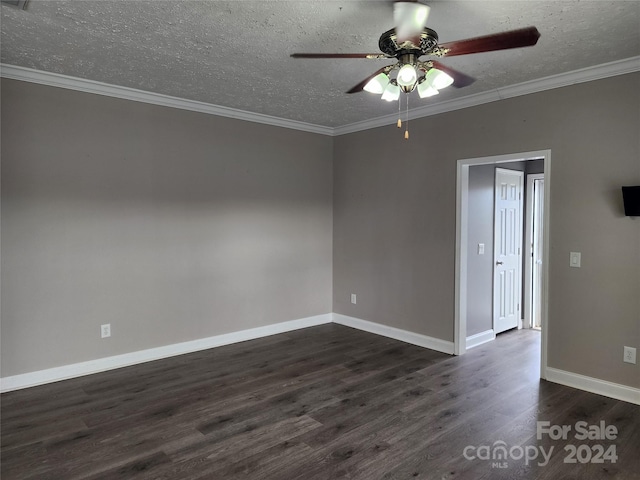 empty room featuring ceiling fan, crown molding, a textured ceiling, and dark hardwood / wood-style flooring