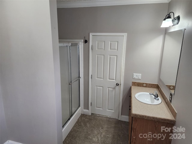 129 Burning Ln, Stony Point, NC 28678 - bathroom featuring a shower stall, vanity, ornamental molding, baseboards, and marble look tiles