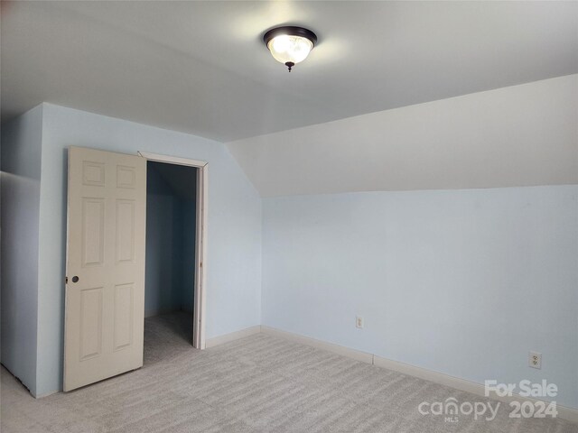129 Burning Ln, Stony Point, NC 28678 - bonus room with vaulted ceiling, light carpet, and baseboards