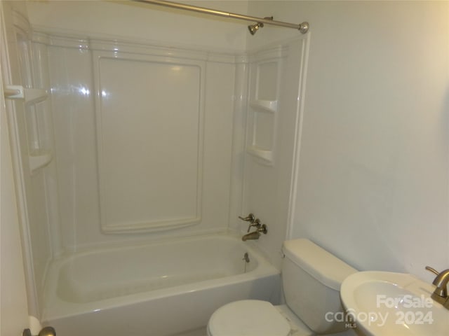 full bathroom with  shower combination, toilet, and sink