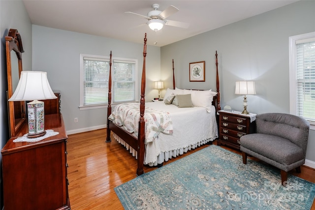 bedroom featuring hardwood / wood-style flooring and ceiling fan